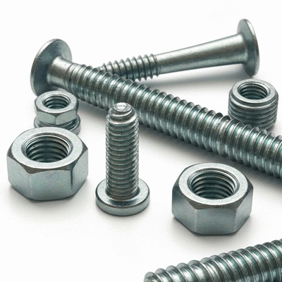 Close-up view of various galvanized and bichromated industrial fixings, showcasing their durability and environmental benefits